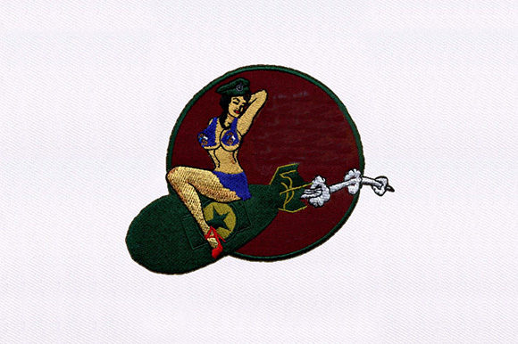 Bomb Perched Woman Design: A Bold Embroidery Statement